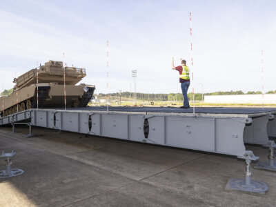 Over-Decking System configured for offloading a tank from a railcar using recently assembled decking system