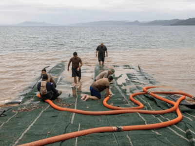 U.S. Navy sailors fill up a submersible matting system to conduct combined joint logistics over-the-shore offloads in preparation for Balikatan 23